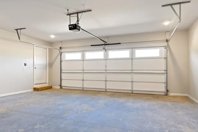 a view of a room with air conditioner and window