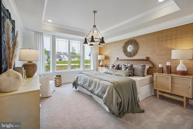 a bedroom with bed and window