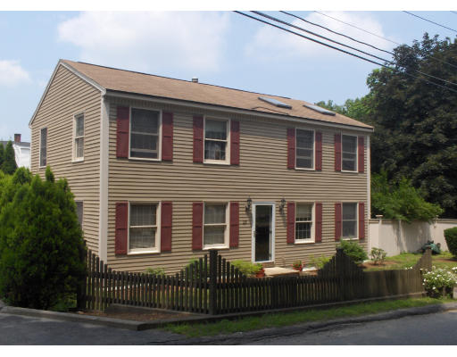 23 Great Road Maynard, MA 01754 - Photo 1 of 11 a front view of house with a garden