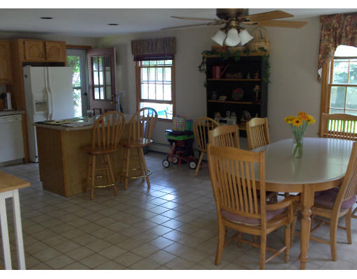 23 Great Road Maynard, MA 01754 - Photo 8 of 11 a view of a dining room with furniture and window