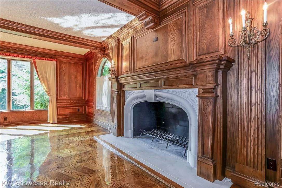 1900 East Vly Road Bloomfield Hills, MI 48304 - Photo 22 of 68 Beautiful Limestone Fireplace Freatured in Family Room. Windows Facing Front of Home.