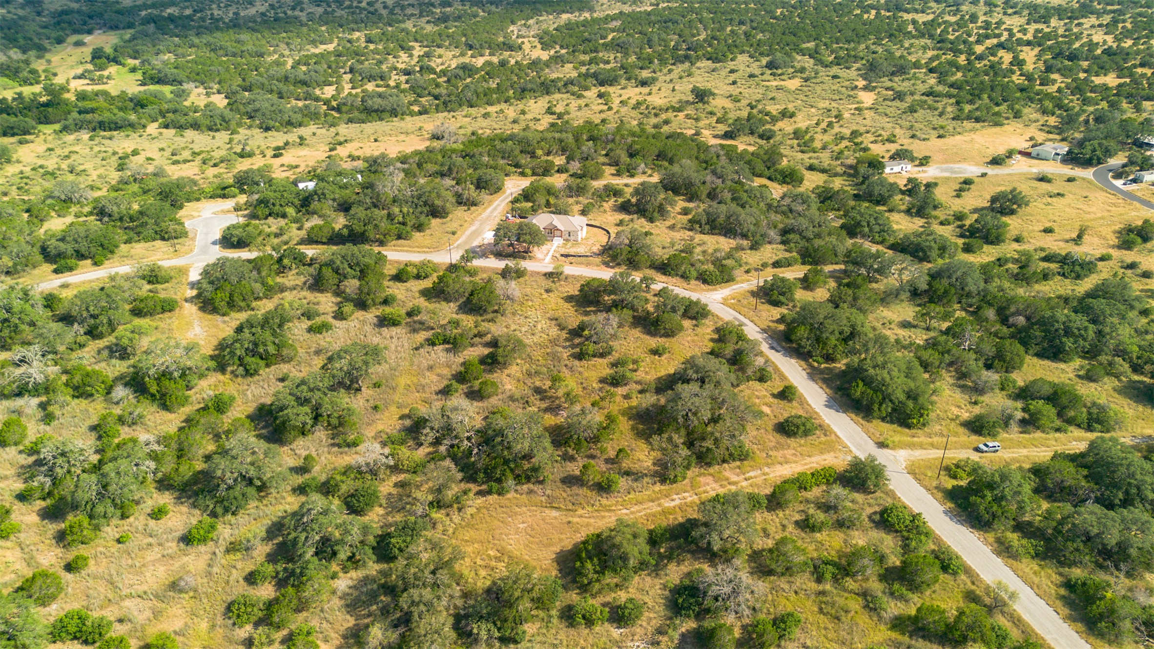 K10146 Horned Toad Road Horseshoe Bay, TX 78657 - Photo 5 of 9 a view of a big yard of the house