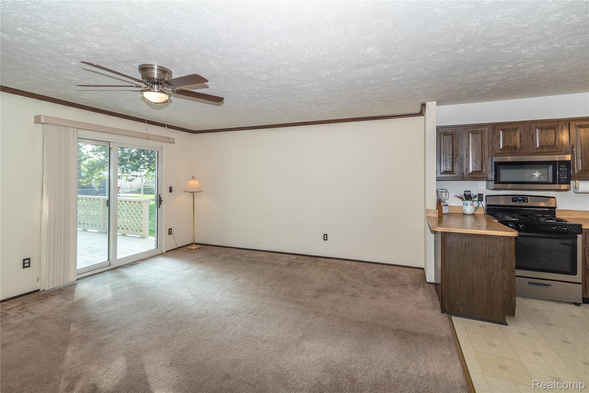1770 Ranier Street Canton, MI 48187 - Photo 12 of 38 Doorwall access to deck from Great Room