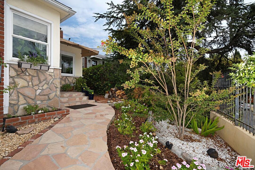 4905 Wiota Street Los Angeles, CA 90041 - Photo 2 of 38 a view of a house with a tree