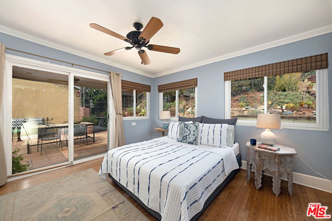 4905 Wiota Street Los Angeles, CA 90041 - Photo 22 of 38 a bedroom with a large bed and a large window