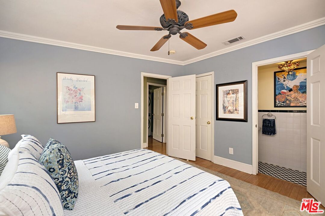 4905 Wiota Street Los Angeles, CA 90041 - Photo 24 of 38 a bedroom with a large bed and a couch