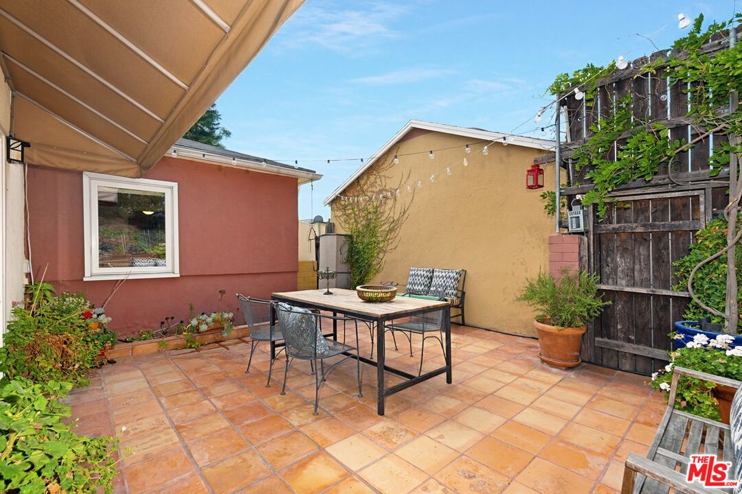 4905 Wiota Street Los Angeles, CA 90041 - Photo 28 of 38 a backyard of a house with outdoor seating