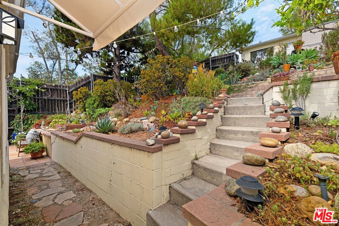 4905 Wiota Street Los Angeles, CA 90041 - Photo 30 of 38 a view of a house with a yard and sitting area