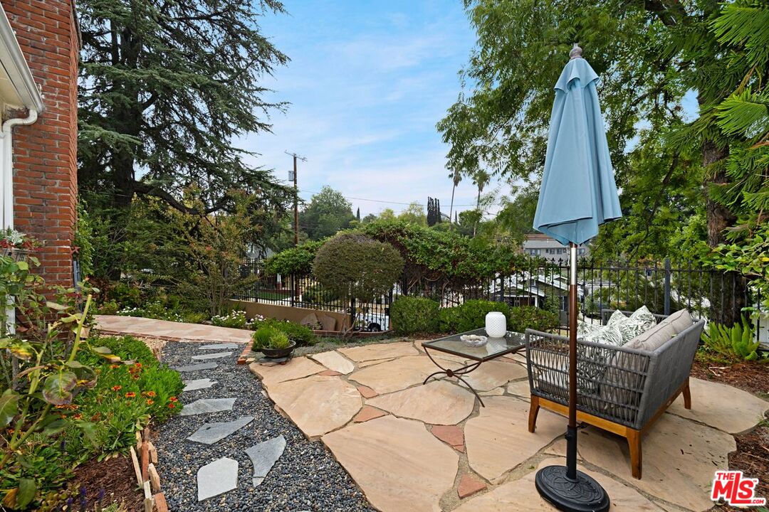 4905 Wiota Street Los Angeles, CA 90041 - Photo 4 of 38 a view of a backyard with furniture and a garden
