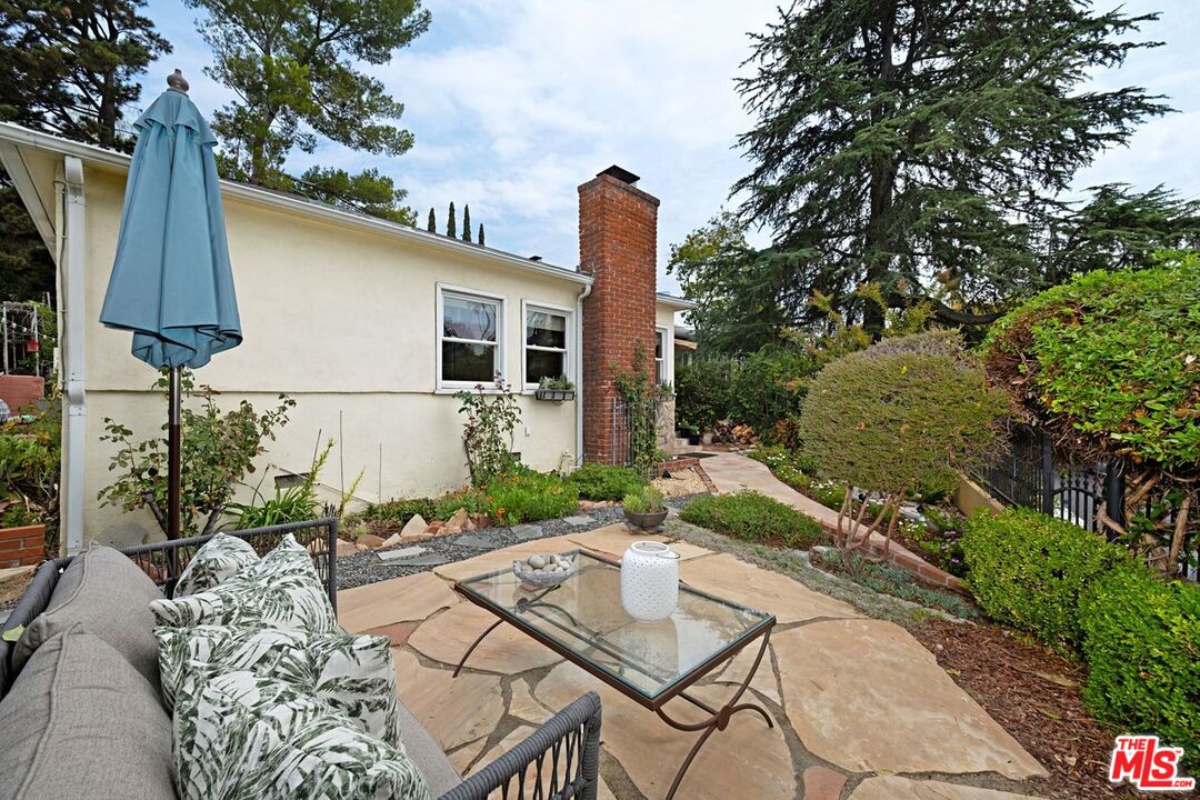 4905 Wiota Street Los Angeles, CA 90041 - Photo 5 of 38 a front view of a house with patio