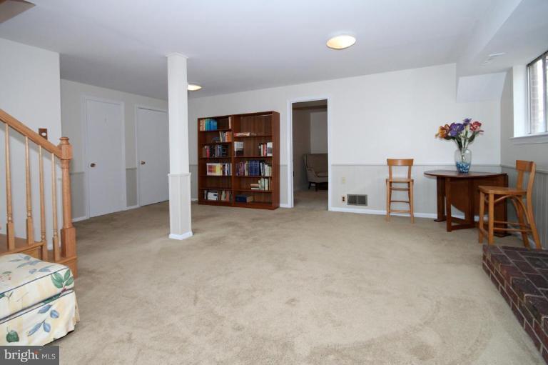 6108 Roxbury Avenue Springfield, VA 22152 - Photo 25 of 30 a view of livingroom with furniture and closet