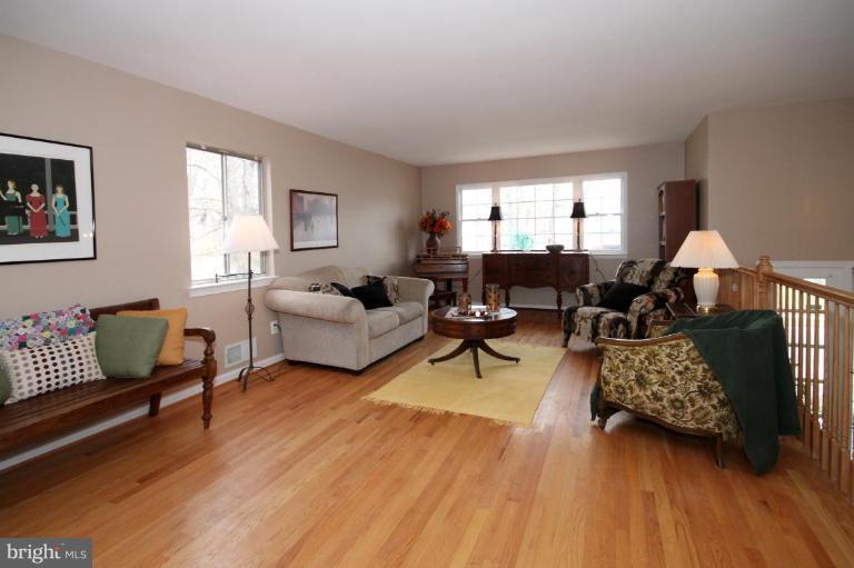 6108 Roxbury Avenue Springfield, VA 22152 - Photo 5 of 30 a living room with furniture and a window