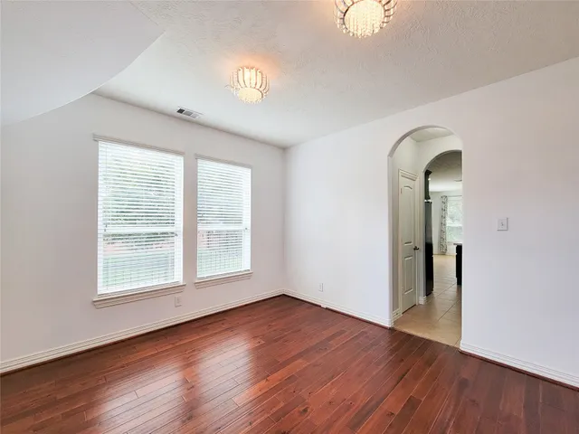 a spacious bathroom with a double vanity sink mirror and