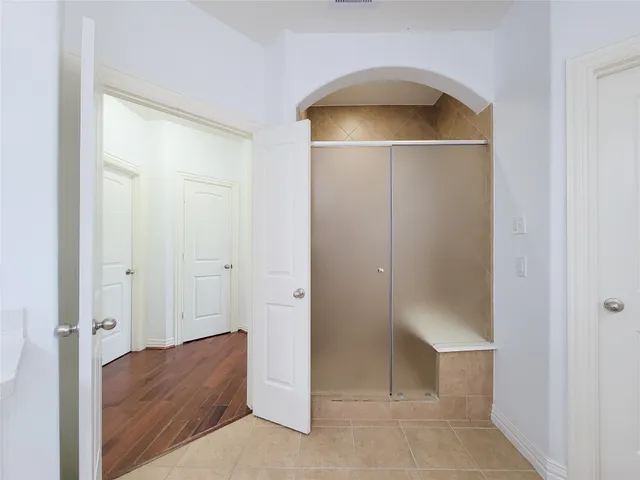 a view of an empty walk in closet