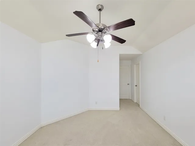 a view of small space with racks on the wall