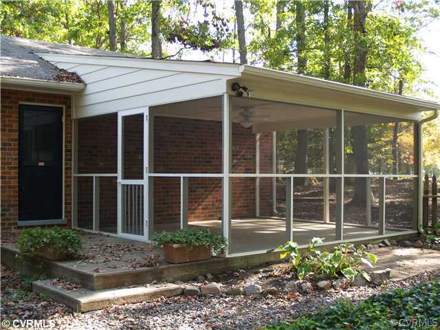 3319 Quaker Road Quinton, VA 23141 - Photo 2 of 11 a view of a house with a garden