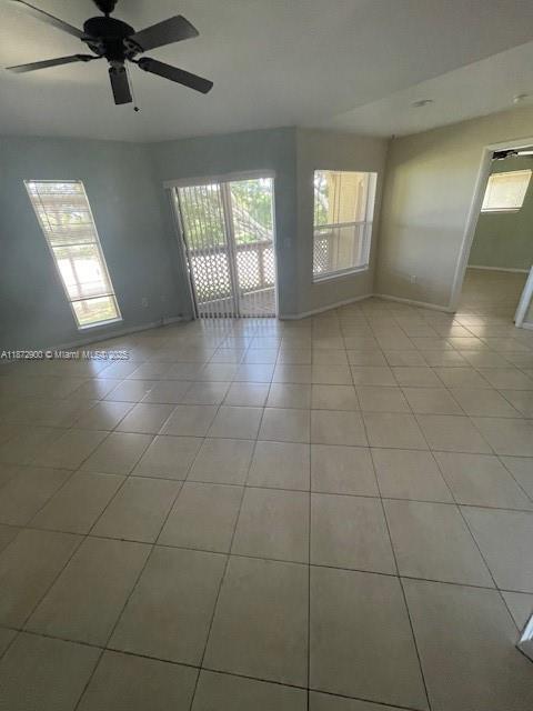 4751 Via Palm Lakes, Unit 419 West Palm Beach, FL 33417 - Photo 9 of 11 a view of an empty room with a window
