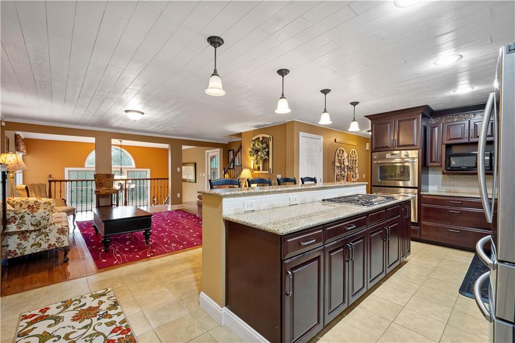 102 Klages Road West Alexander, PA 15376 - Photo 11 of 50 a large kitchen with kitchen island a large island in it