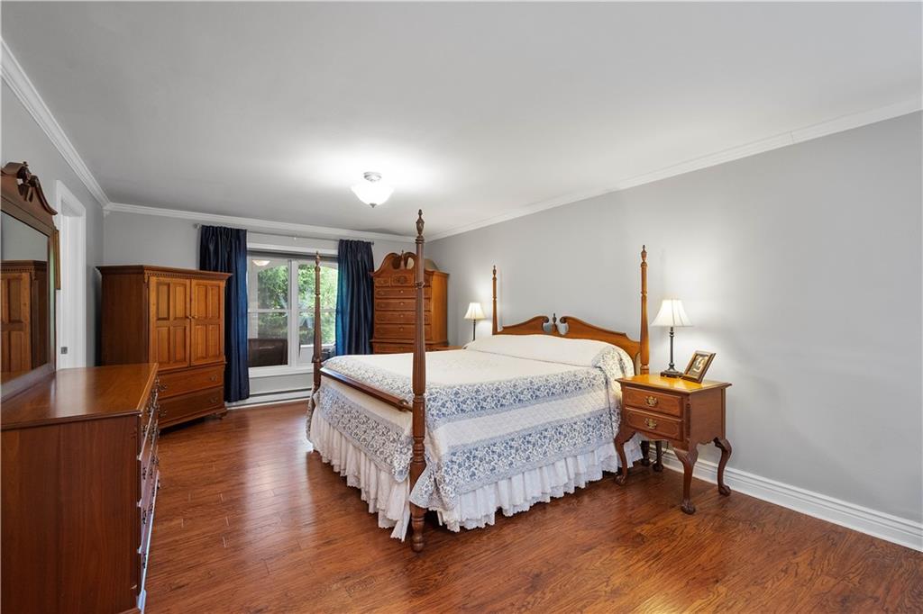 102 Klages Road West Alexander, PA 15376 - Photo 20 of 50 a bedroom with a bed and wooden floor