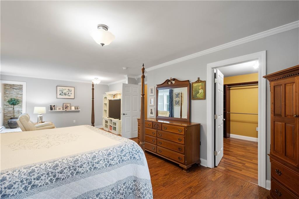 102 Klages Road West Alexander, PA 15376 - Photo 21 of 50 a spacious bedroom with a bed and a dresser