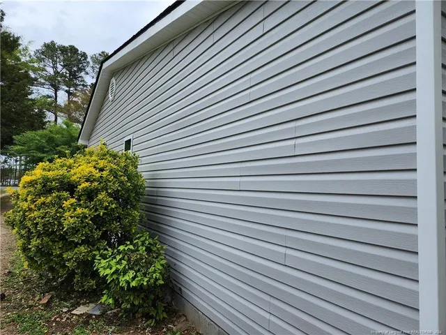 a view of a wooden fence