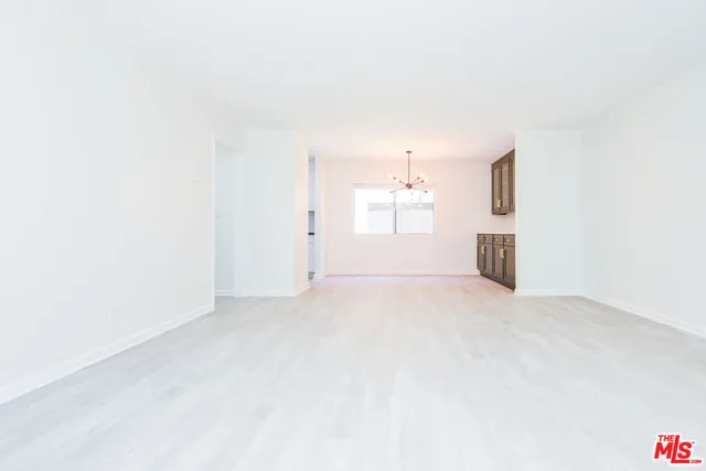 a view of empty room with a empty space