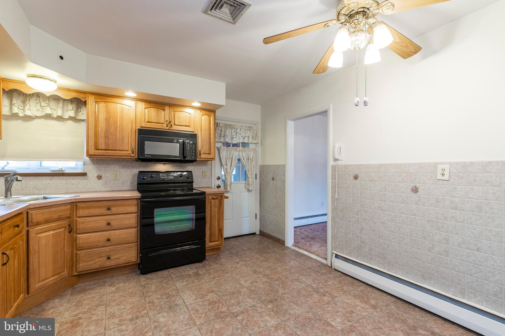 101 James Road Broomall, PA 19008 - Photo 13 of 32 Kitchen with access to Three Season Room