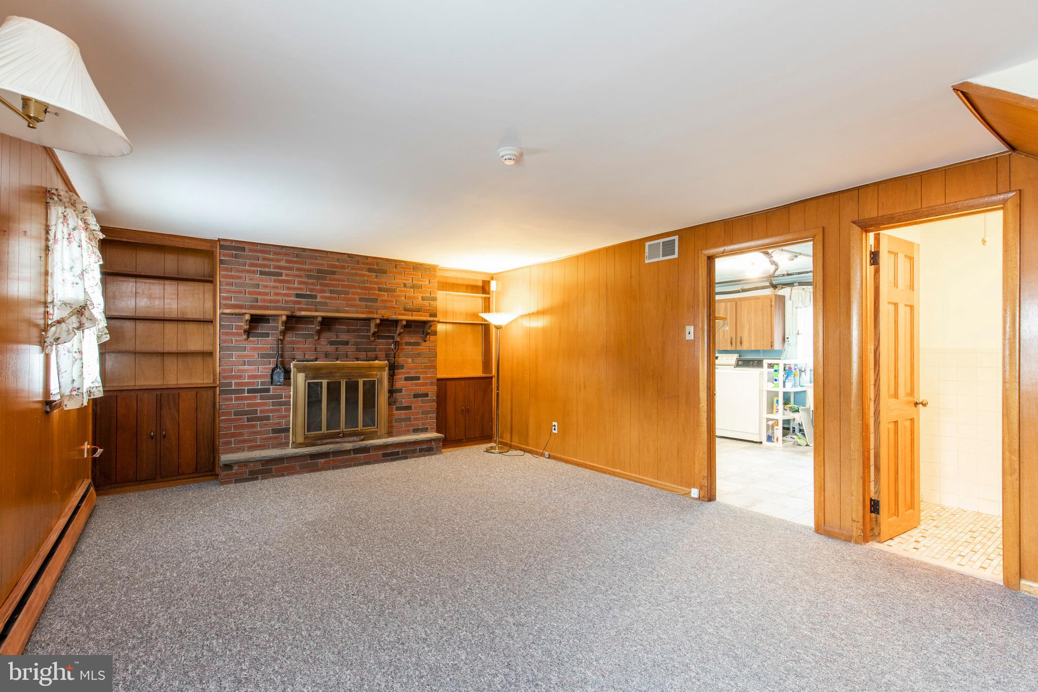 101 James Road Broomall, PA 19008 - Photo 17 of 32 Lower Level Family Room with Fireplace