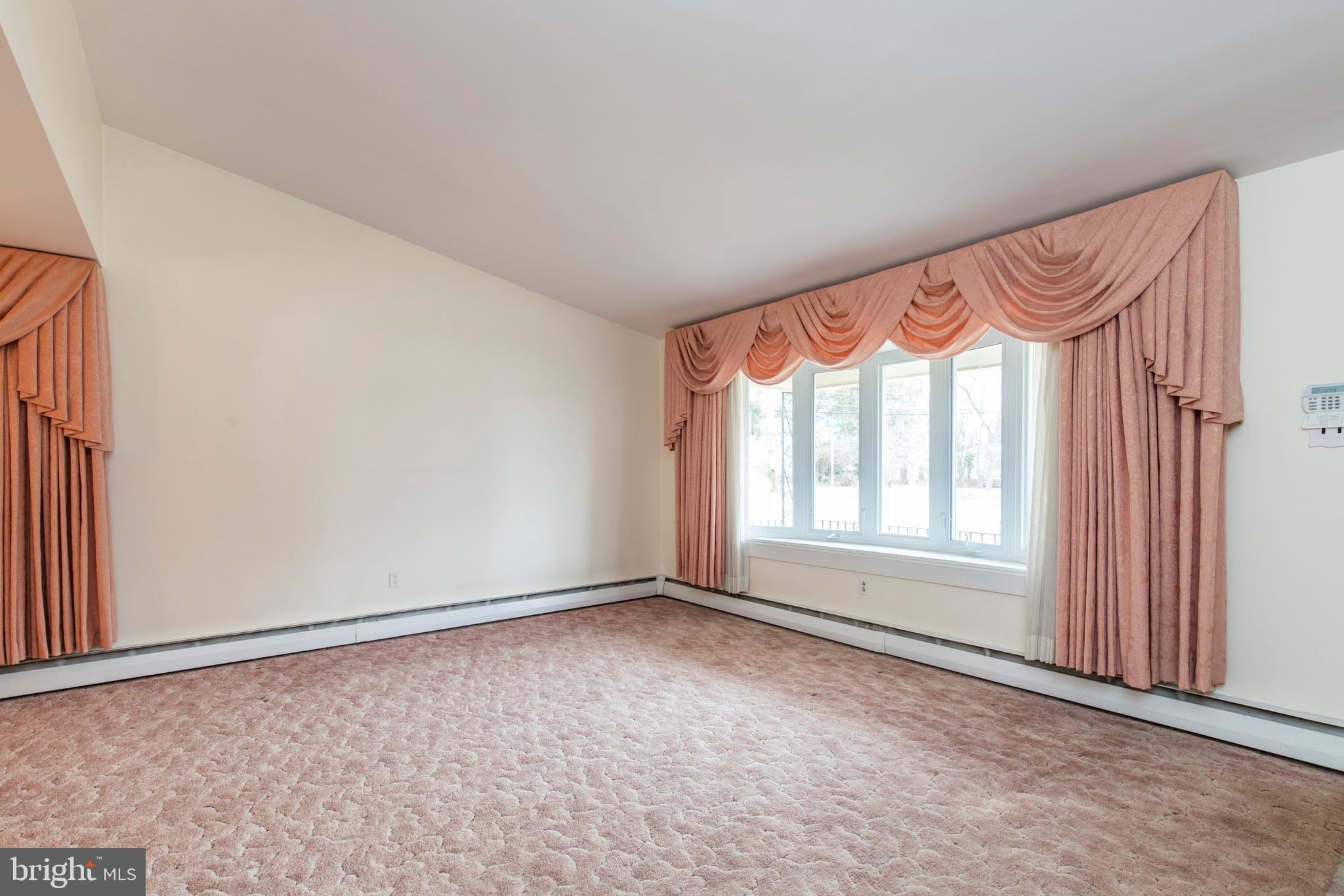 101 James Road Broomall, PA 19008 - Photo 6 of 32 Living room with Bay Window & Vaulted ceiling
