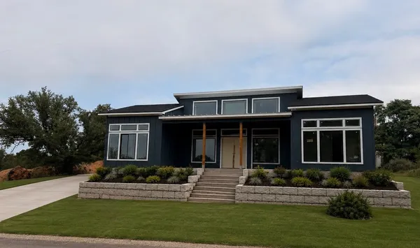 front view of a house with a yard