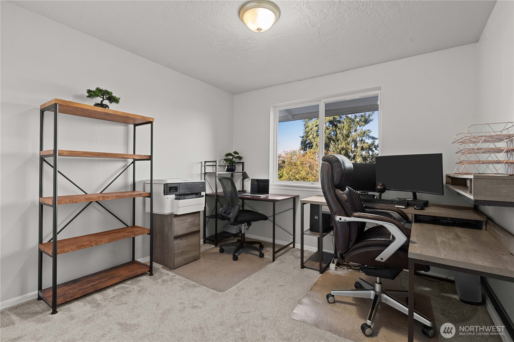 3907 Southwest 328th Street Federal Way, WA 98023 - Photo 22 of 40 a view of a workspace with furniture and a window