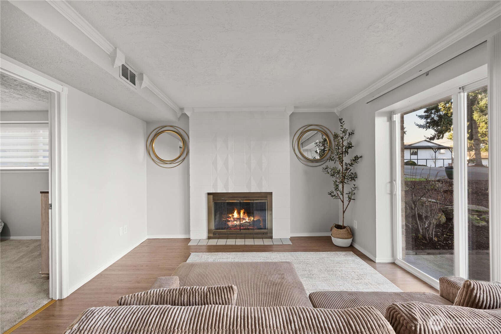 3907 Southwest 328th Street Federal Way, WA 98023 - Photo 25 of 40 a living room with furniture and a fireplace