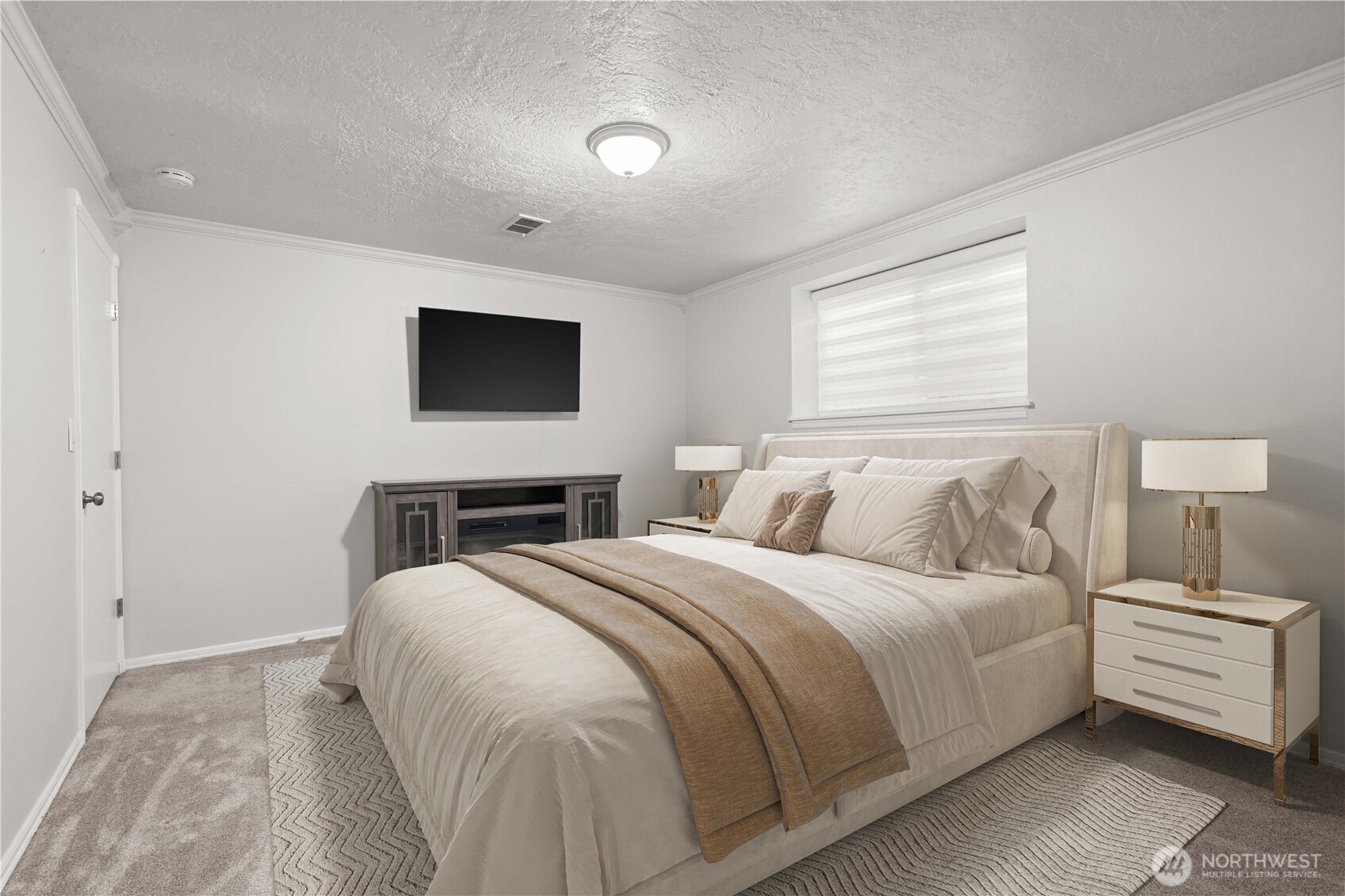 3907 Southwest 328th Street Federal Way, WA 98023 - Photo 29 of 40 a bedroom with a bed and a flat screen tv