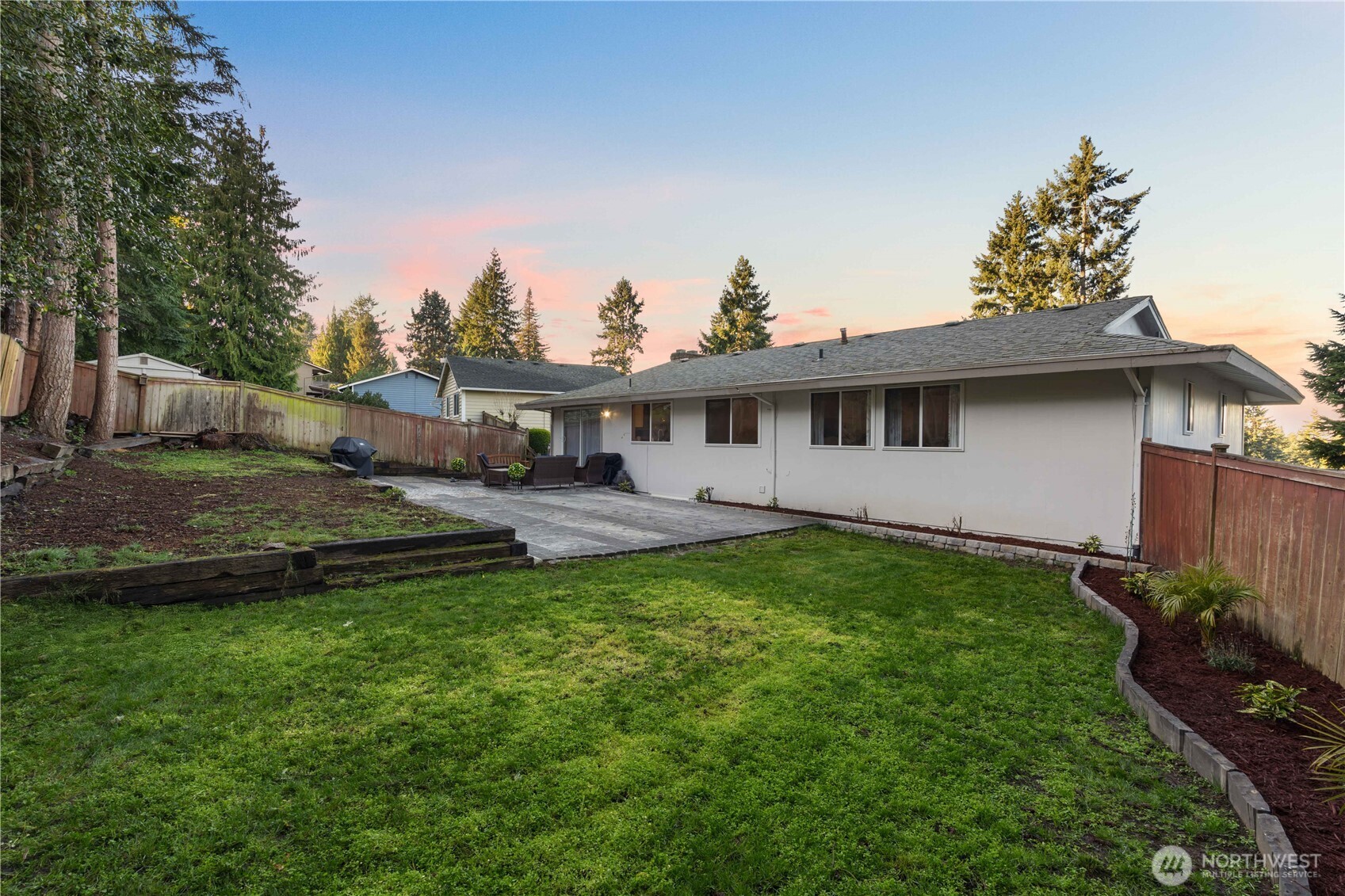 3907 Southwest 328th Street Federal Way, WA 98023 - Photo 33 of 40 a view of a house with backyard and sitting area