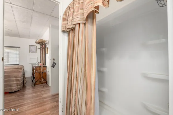a view of hallway with livingroom and bedroom