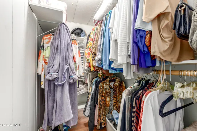 a view of swimming pool with a garden and seating area