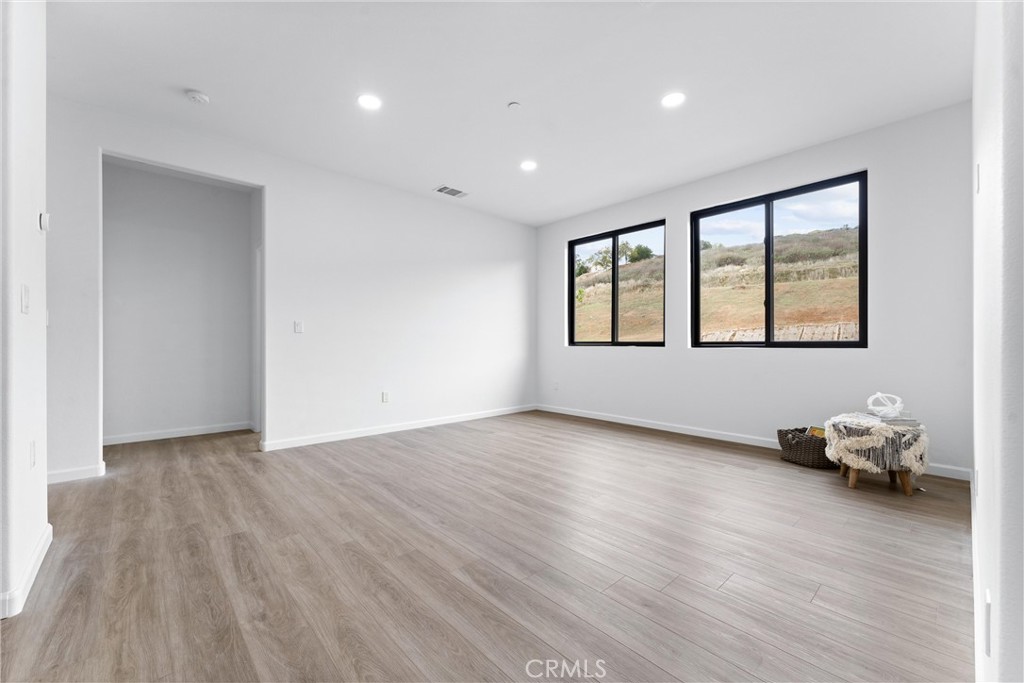 1993 Lyon Avenue Riverside, CA 92503 - Photo 23 of 61 a view of a room with wooden floor and window