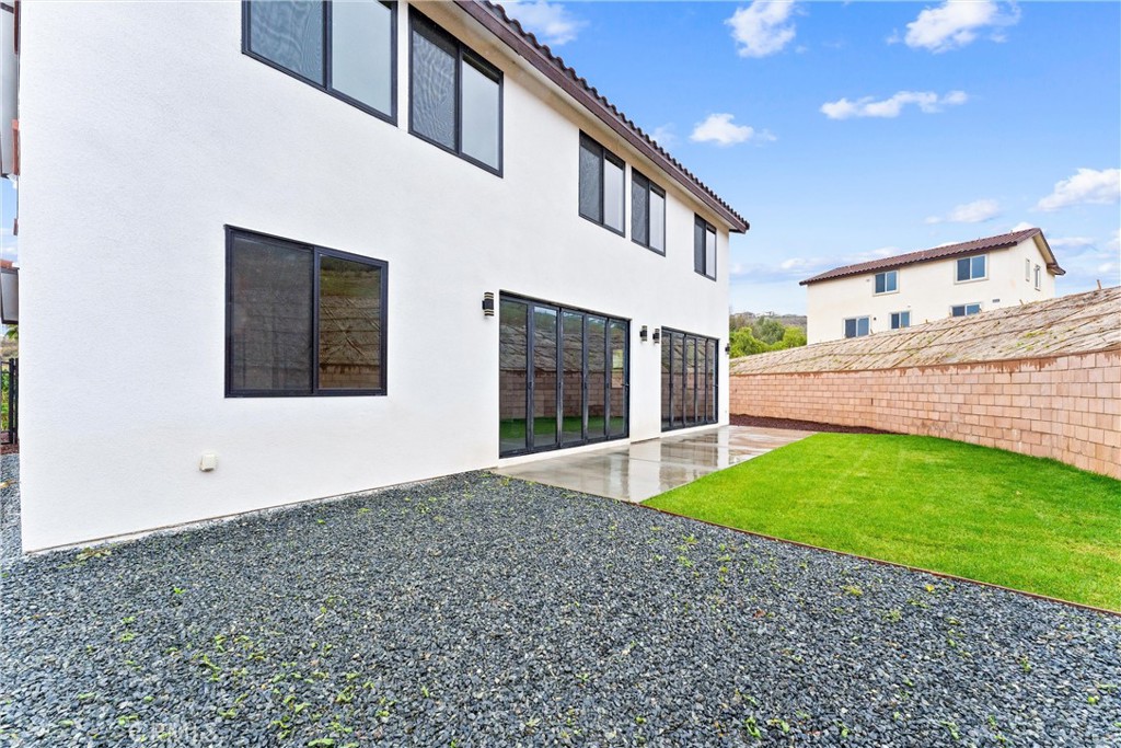 1993 Lyon Avenue Riverside, CA 92503 - Photo 57 of 61 a view of a house with a garden
