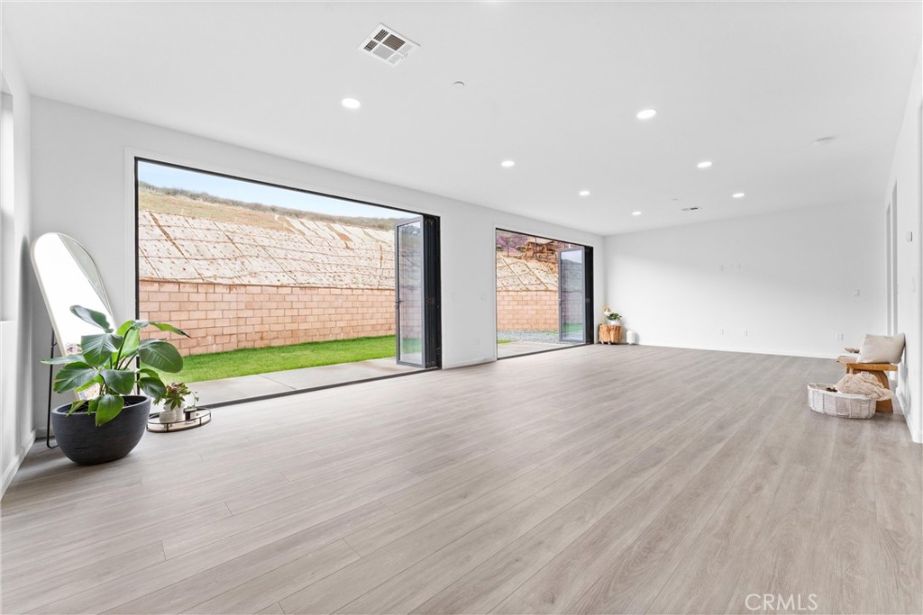 1993 Lyon Avenue Riverside, CA 92503 - Photo 10 of 61 a view of an empty room with a window