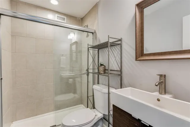 a view of a house with swimming pool and sitting area