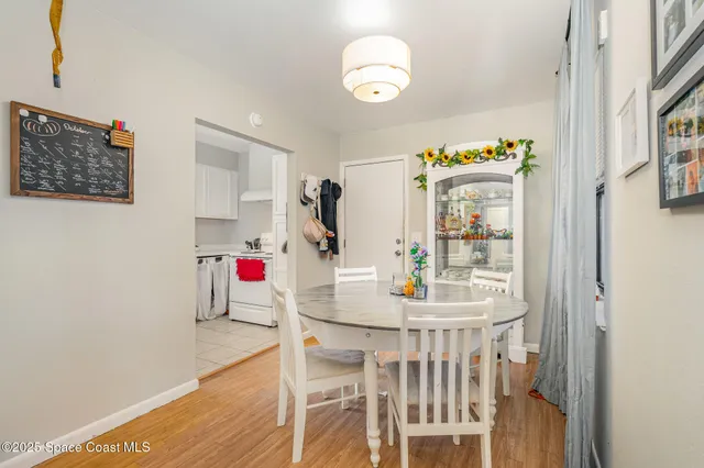 a view of a dining room with furniture
