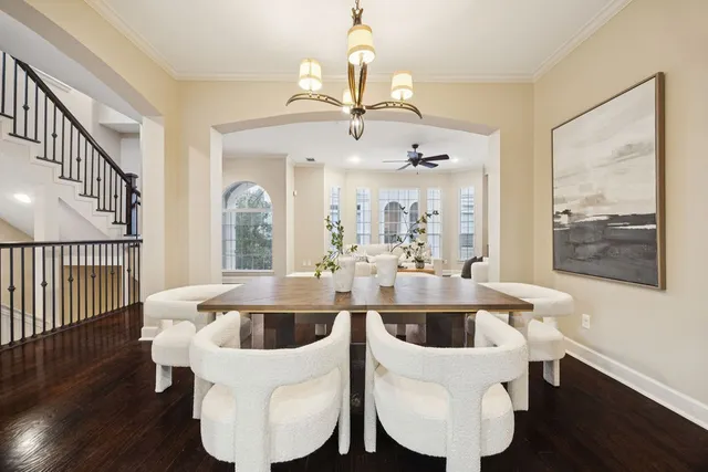 a kitchen with sink and chandelier