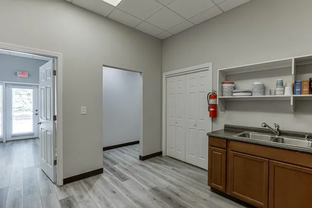 a room with furniture and a flat screen tv