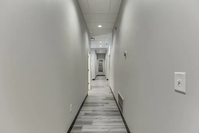 a view of a workspace with furniture