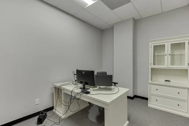 a kitchen with a stove and a microwave