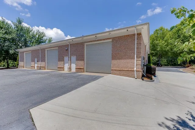 a view of cabinet with white walls