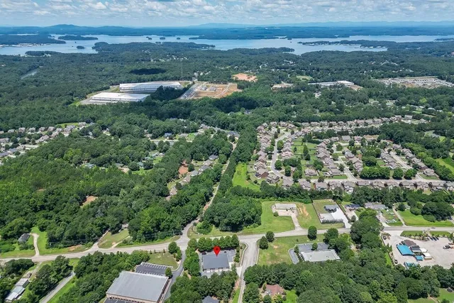 a view of house with garden and entertaining space
