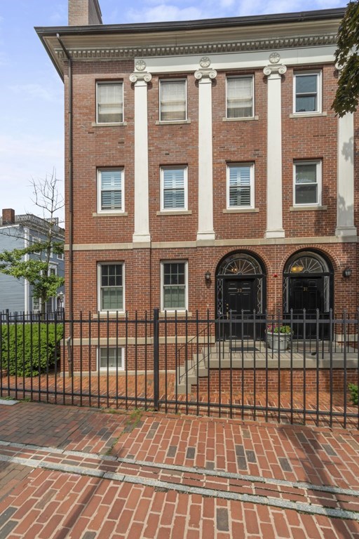 33 Main Street Boston, MA 02129 - Photo 17 of 17 a view of a brick building with many windows