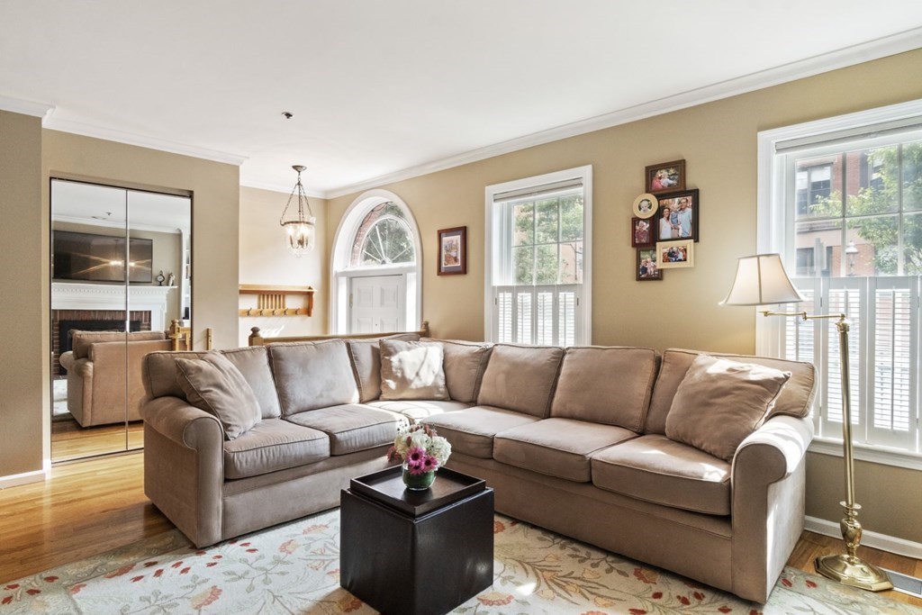 33 Main Street Boston, MA 02129 - Photo 3 of 17 a living room with furniture and a large window