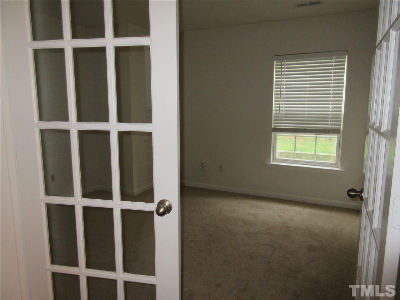 5253 Thornton Road Raleigh, NC 27616 - Photo 2 of 20 a view of an empty room with a window